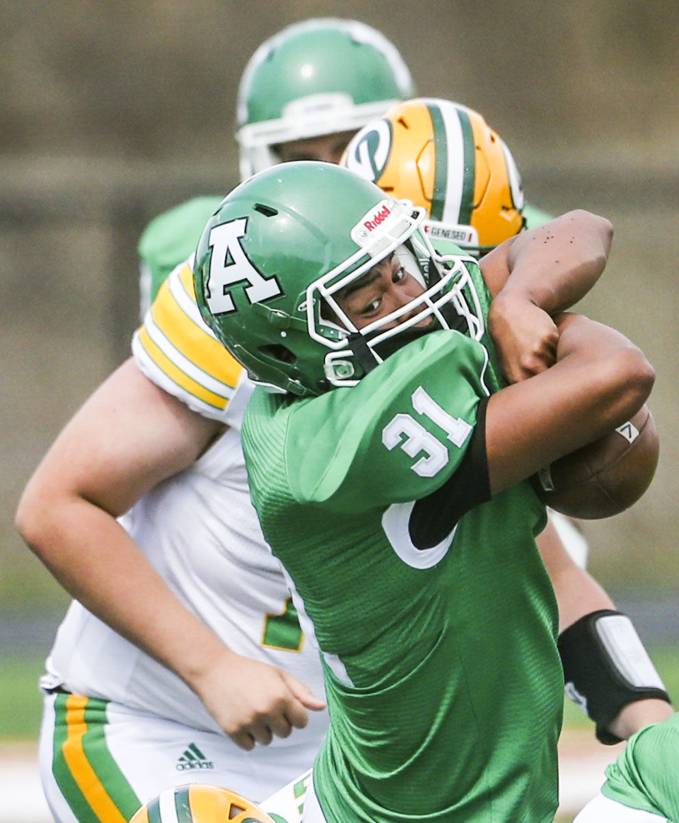 040521-qc-spt-gen-alleman-fball-4.JPG